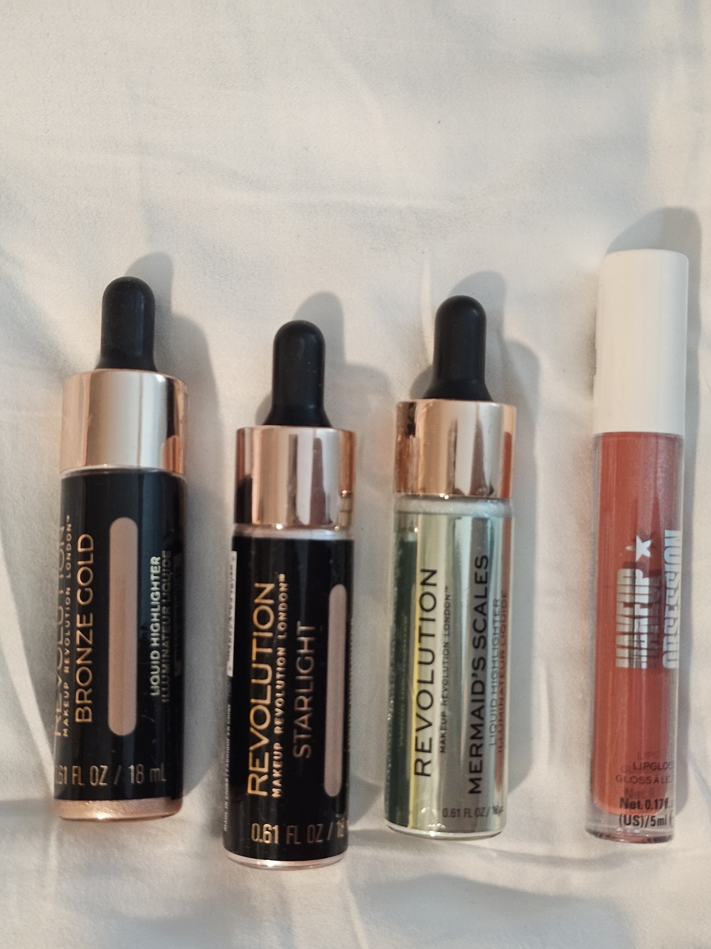 Makeup Revolution Highlighter & Lip Gloss Bundle – New Sealed